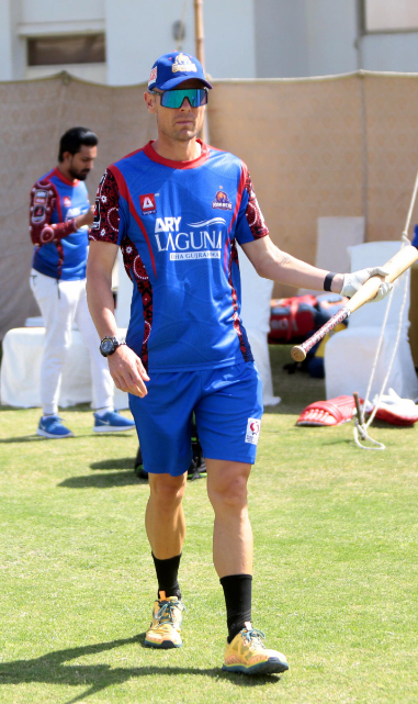 Kings coach Johan Botha joins the training session